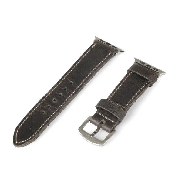 Dark brown full-grain leather watch strap with silver buckle and white stitching, isolated on white