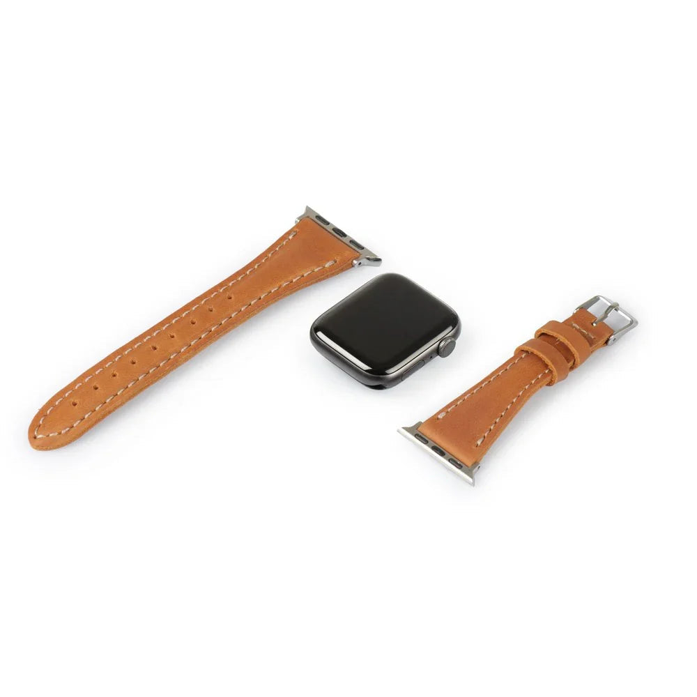 Brown full-grain leather Apple Watch strap set with silver hardware on white background